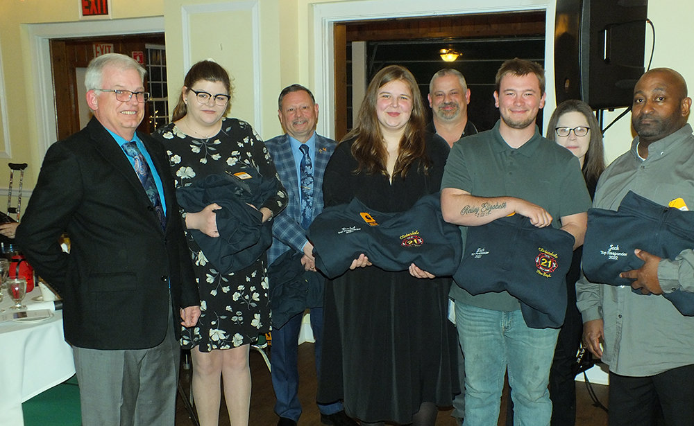 Eight Top Responders to emergency calls were honored for their service with personalized Clintondale Fire Department sweatshirts at the Installation dinner. L-R Chief Rick Brooks, Meghan Shoureck, Mike Signorelli, Rachael Robinson, Jeremy Nash, Zach Adolphsen, Sherri Mackey and Jack Lunsford.
